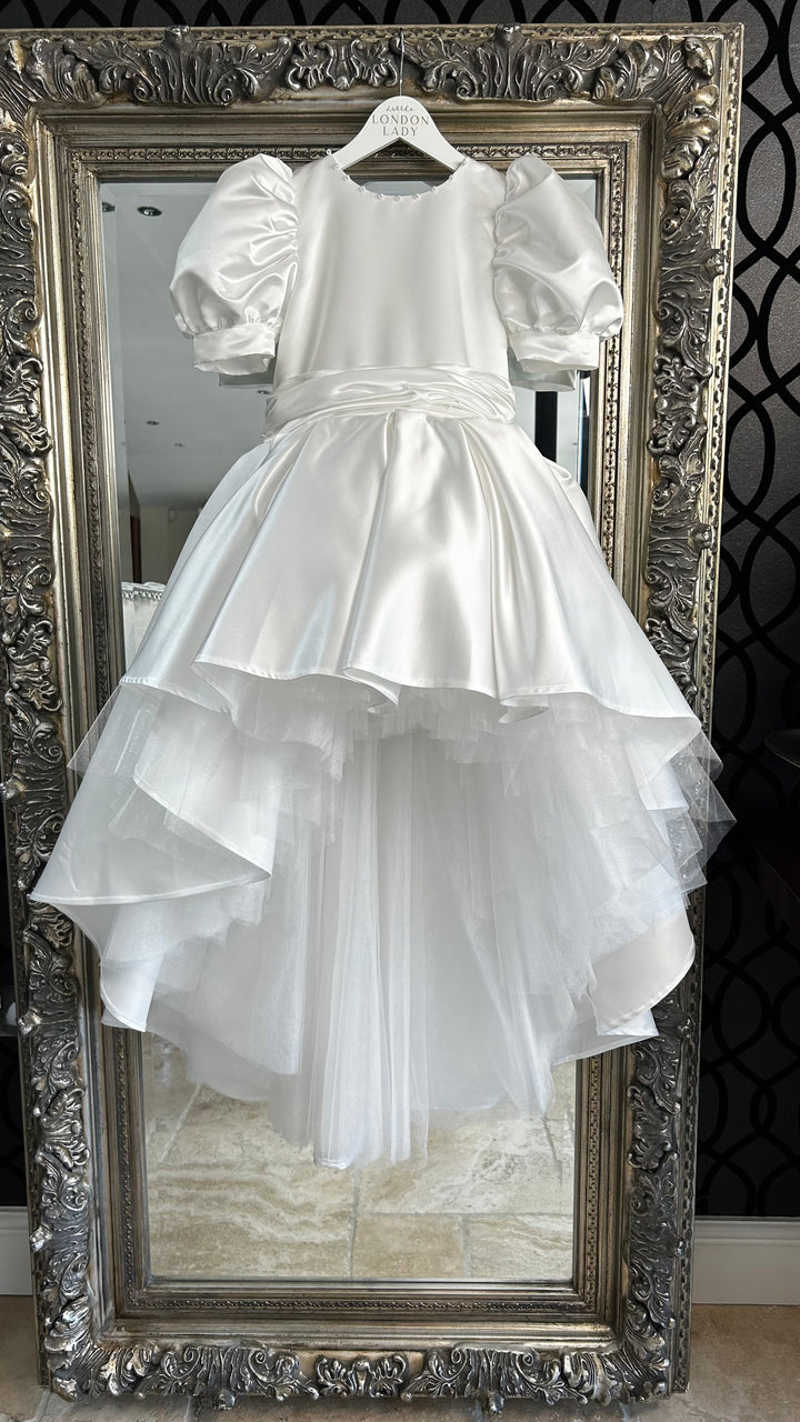 Flower girl dress in ivory satin with pearl back and sweetheart back.