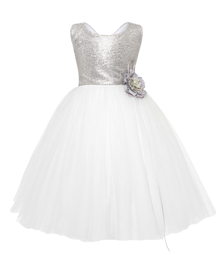 The City Shimmer White and Silver sequins Childrens designer dresses. beautiful and hand made in England. The City Shimmer childrens dress with Silver Sequin Bodice and adjustable straps. A line white tulle skirt and oversized white satin bow and tails at the back. This dress is perfect for Flower girls, little bridesmaids, pageants, wedding guest, birthday parties or any special occasion. Size 1 Years to 10 years