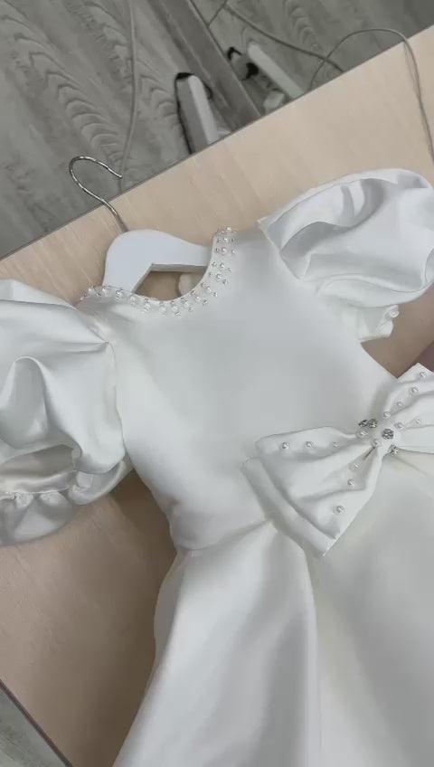 The Sofia dress with Short Puff Sleeve.