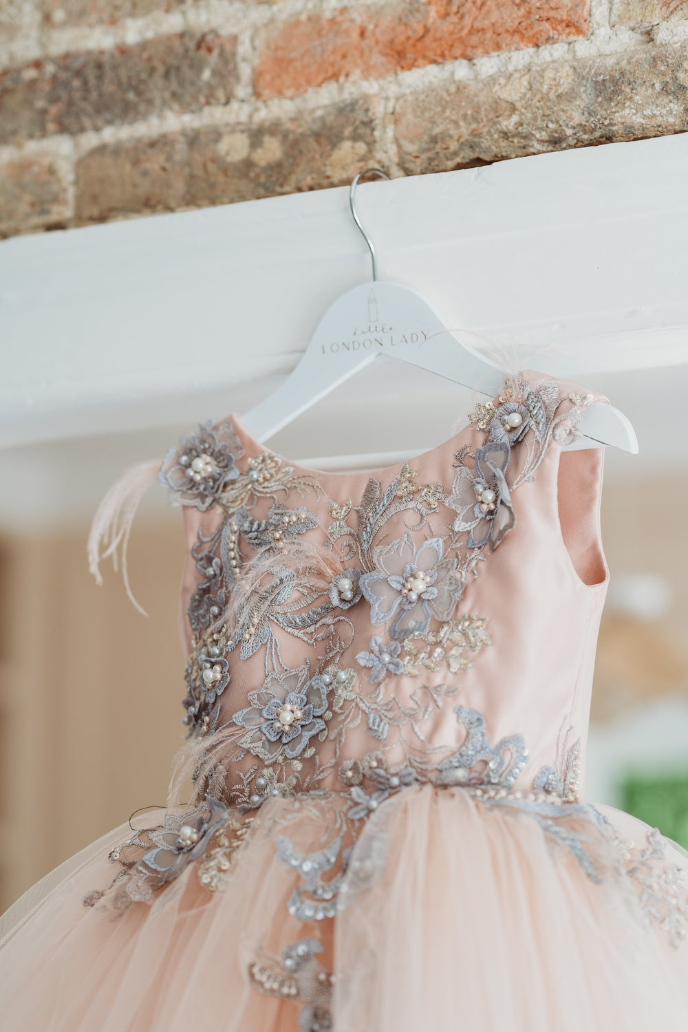 Designer Couture Childrens Dress with train. Hand sewn 3D Flowers, pearls and sequins Bodice with a short blush Ballerina tutu skirt. Long Tulle detachable train for that WOW factor . Fully lined in cotton for ultimate comfort