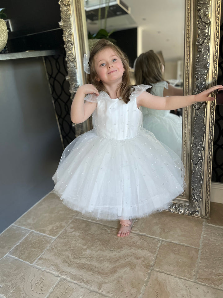 Little girl Tutu dress ideal for flower girls or christening outfit.