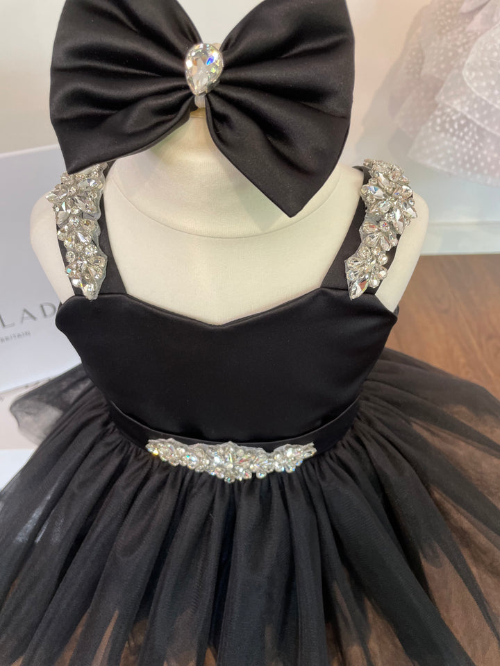 The SweetPea TUTU Dress for little girls. The perfect kids Little Black Dress. . This Tulle TUTU  is perfect for any Black tie Event.  Each dress has 3  Crystal Rhinestone Embellishments. , large, soft Black Satin Bow and long Black Satin Tails , Black satin Hair clip, makes the perfect Baby Dress, Baby Tutu Dress,. Luxury childrens pink tutu dress with large Pink satin oversized bow and sparkling crystal embellishments.