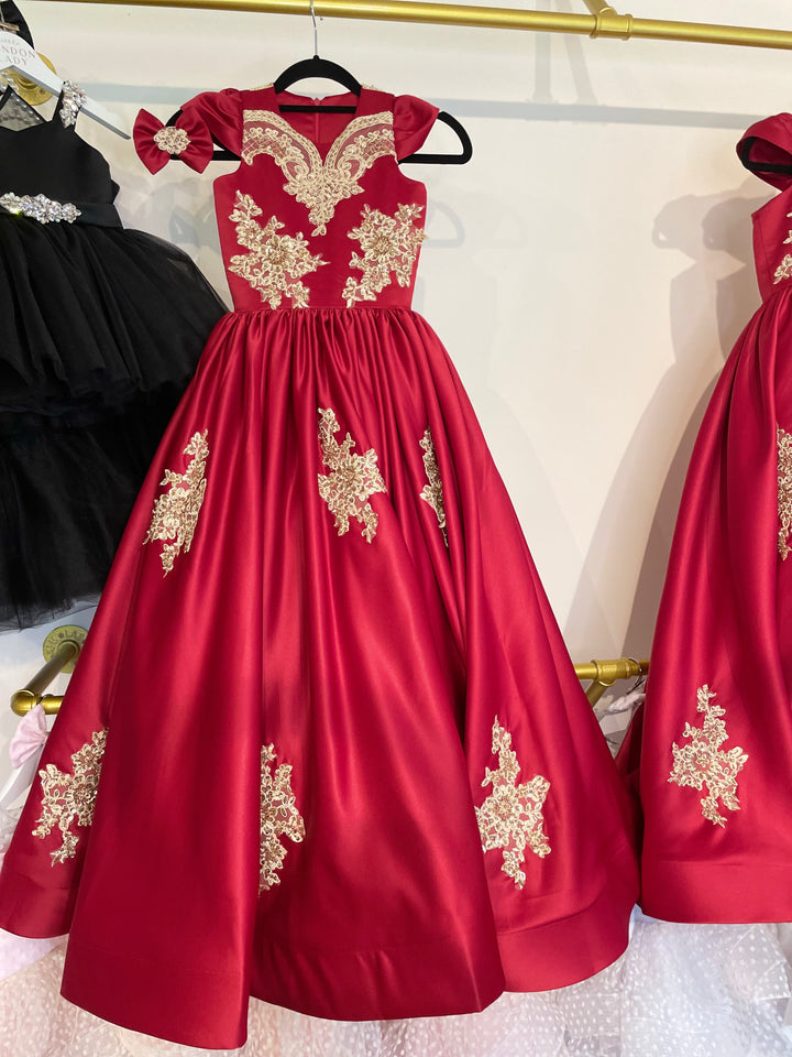 Custom Couture Flower girl Dress. Luxury Maroon Satin and Gold 3D Lace Appliques with beautifiul Feather Sleeves Designed for a client in the UK. Handmade by artisans. Created for any special Occasion.
