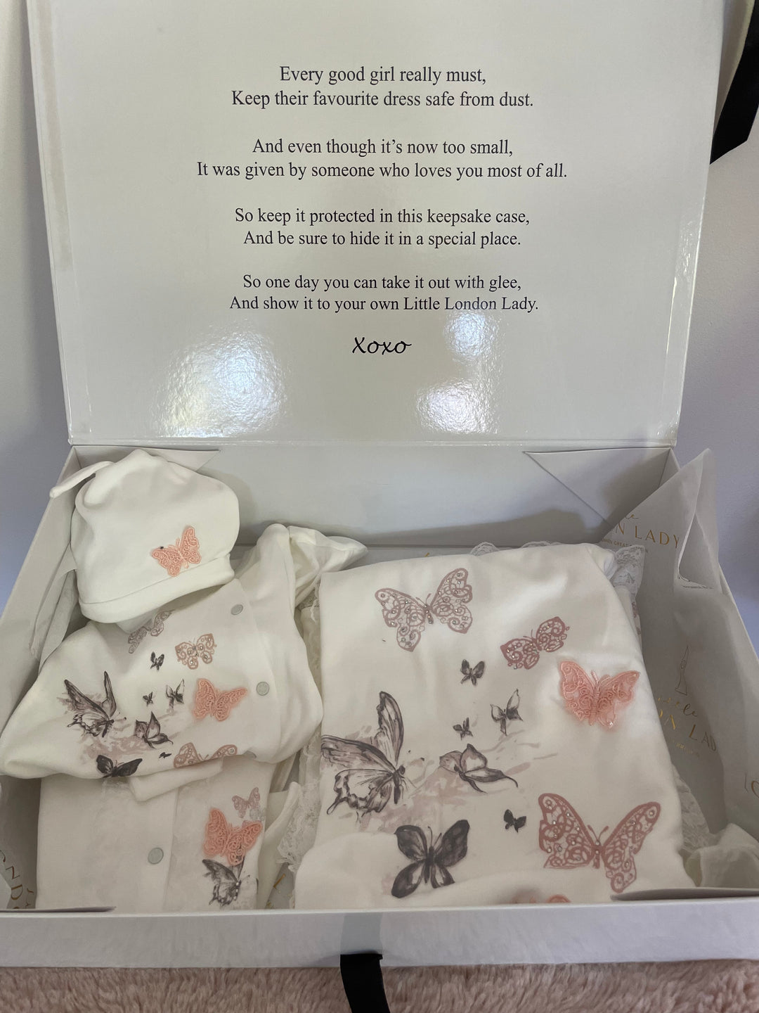 This 10 piece set features printed and handsewn embellished butterflies. Each newborn set includes knotted hat, bib, set of baby mitts, socks, footed popper body suit with butterfly and delicate sparkles, casual suit with footed leggings and matching long sleeved lace trimmed cardigan, white body suit with poppers, blanket with precious lace trim and butterfly details & muslin. All wonderfully soft to ensure little ones are at their most comfortable.