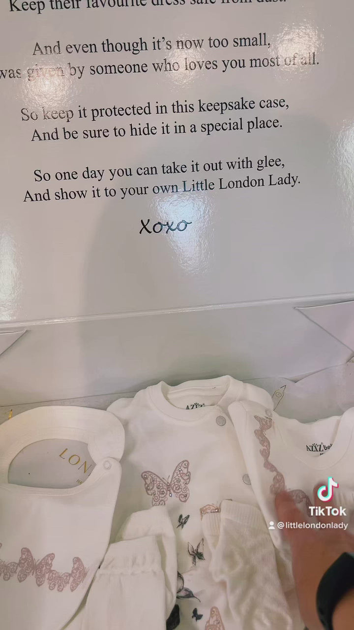This beautiful embroidered piece is perfect for any occasion. It is 100% hand crafted. A perfect gift for any princess. This 10 piece set features printed and handsewn embellished butterflies. Each newborn set includes knotted hat, bib, set of baby mitts, socks, footed popper body suit with butterfly and delicate sparkles, casual suit with footed leggings and matching long sleeved lace trimmed cardigan, white body suit with poppers, blanket with precious lace trim and butterfly details & muslin. 