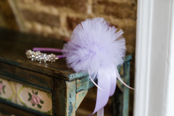 The most darling Flower girl wands for your little lady.  The softest tulle Pom Pom to complement any occasion. A beautiful and fun alternative to a flower girl bouquet.Something to keep forever, a party favour, nursery décor or centre piece for your special occasion. With Silver Tiara 