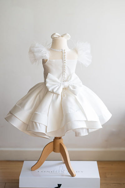 kids occasion dress in ivory satin and feather details