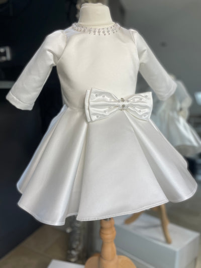 The Sofia Dress in Ivory White Satin. The Perfect baptism or christening dress. fully lined for comfort. Long Satin sleeves. 